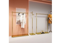 Стійка для торгівлі одгом та сукнями з золотою полицею